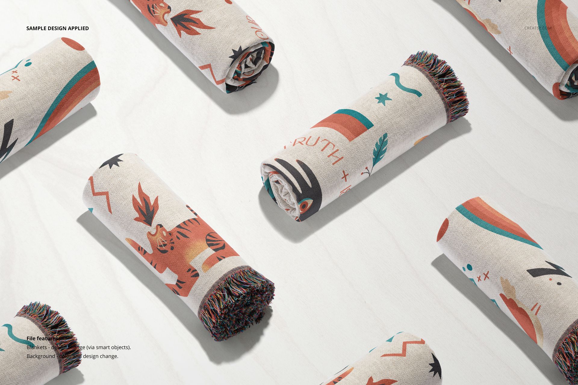 Jacquard fringed throw blankets mockup set showing several rolled blankets with playful patterns and multicolor accents.