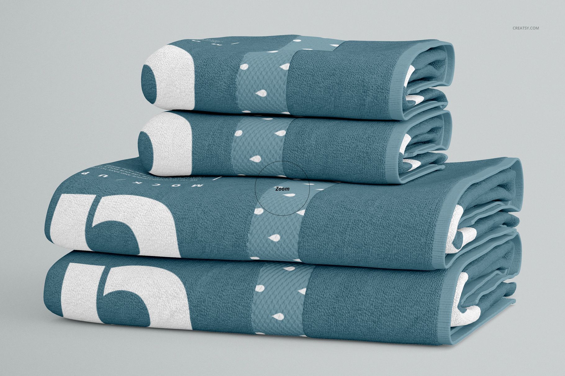Bath towel PSD mockup featuring a pile of blue towels with white accents, viewed from the front side perspective.