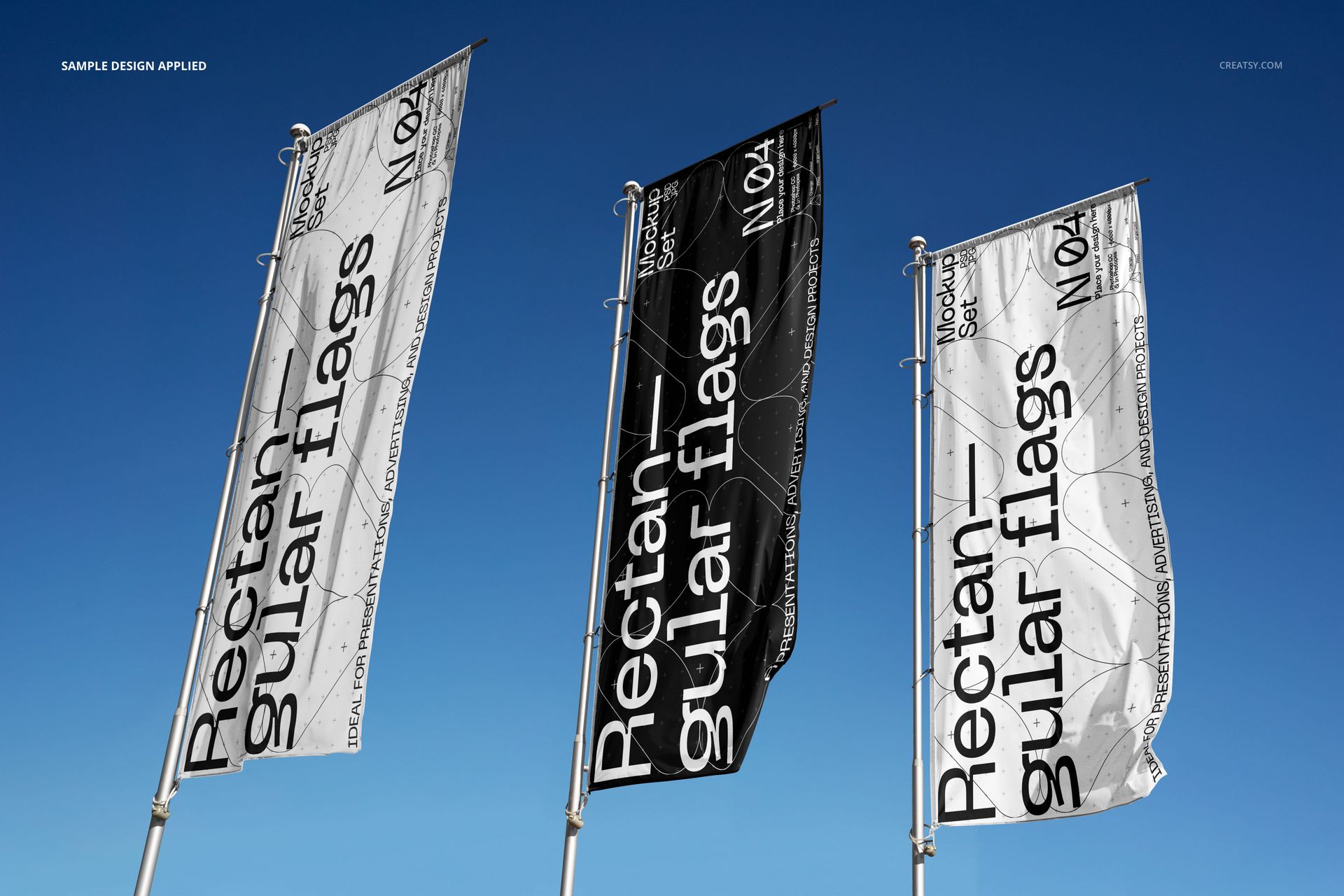 Rectangular flag mockup set featuring three vertical flags in monochrome colors, shown from a low front angle outdoors.