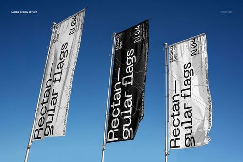 Rectangular flag mockup set featuring three vertical flags in monochrome colors, shown from a low front angle outdoors.