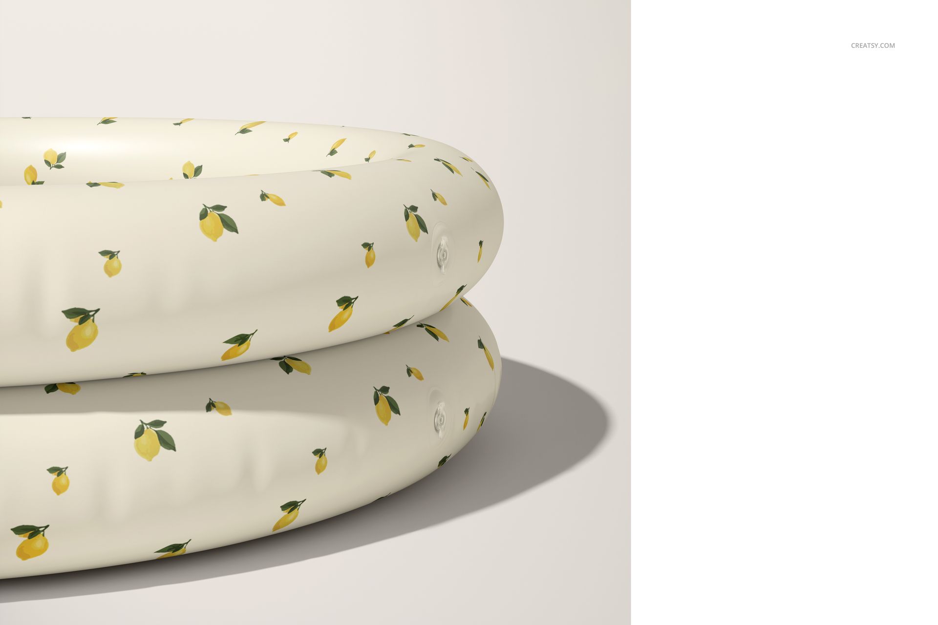 Round inflatable pool for children, decorated with small yellow lemons and green leaves, displayed in a PSD mockup.