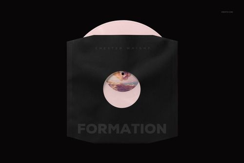 Pink colored vinyl record mockup displayed in a black sleeve with a round window, viewed from above on a black backdrop.