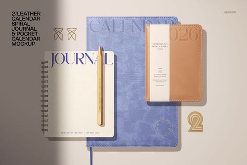 Stationery mockup featuring a spiral-bound journal, blue calendar, tan planner, and desk props on a neutral background.