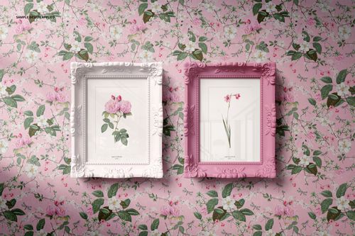 Classic painted picture frame PSD mockup featuring two decorative frames with botanical artwork on a floral wallpaper background.