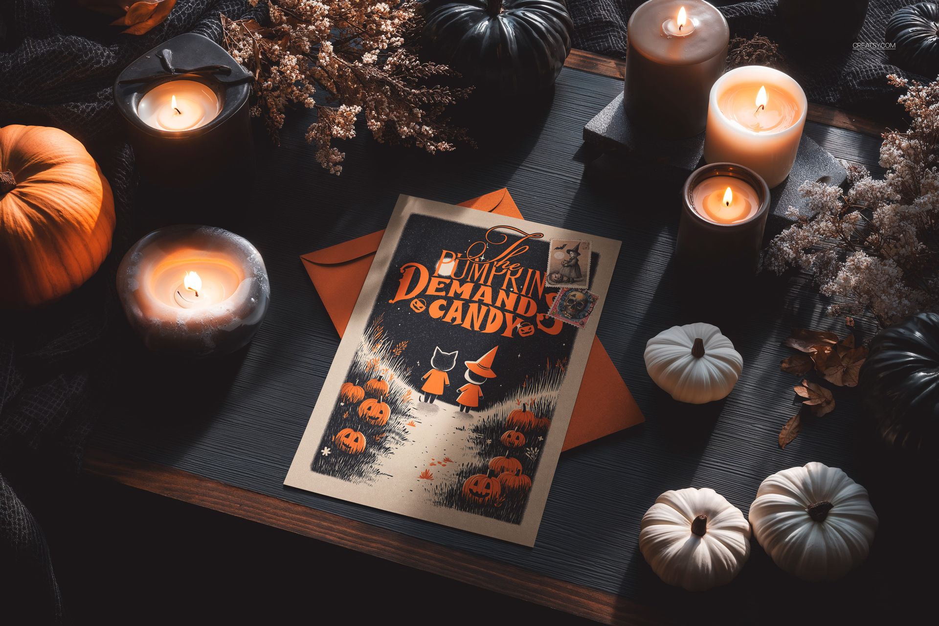 Halloween greeting card mockup displayed on a dark table with candles, pumpkins, and autumn leaves around it.