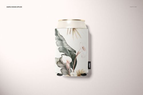 Single neoprene can cooler mockup featuring botanical leaves and flowers, shown upright with soft lighting.