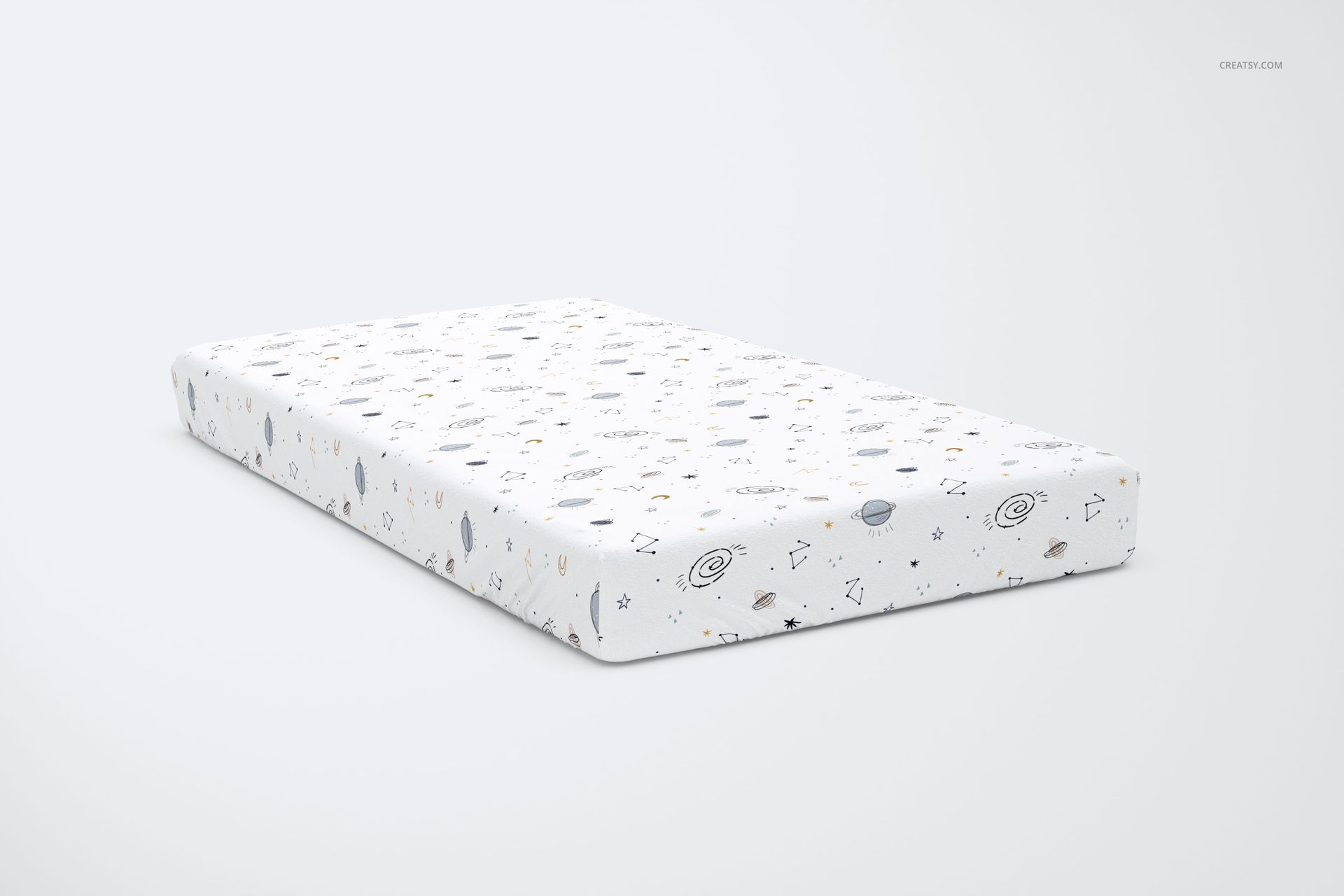 PSD mockup of a children's bed sheet with whimsical space motifs, including planets and stars, presented in a bedroom scene.
