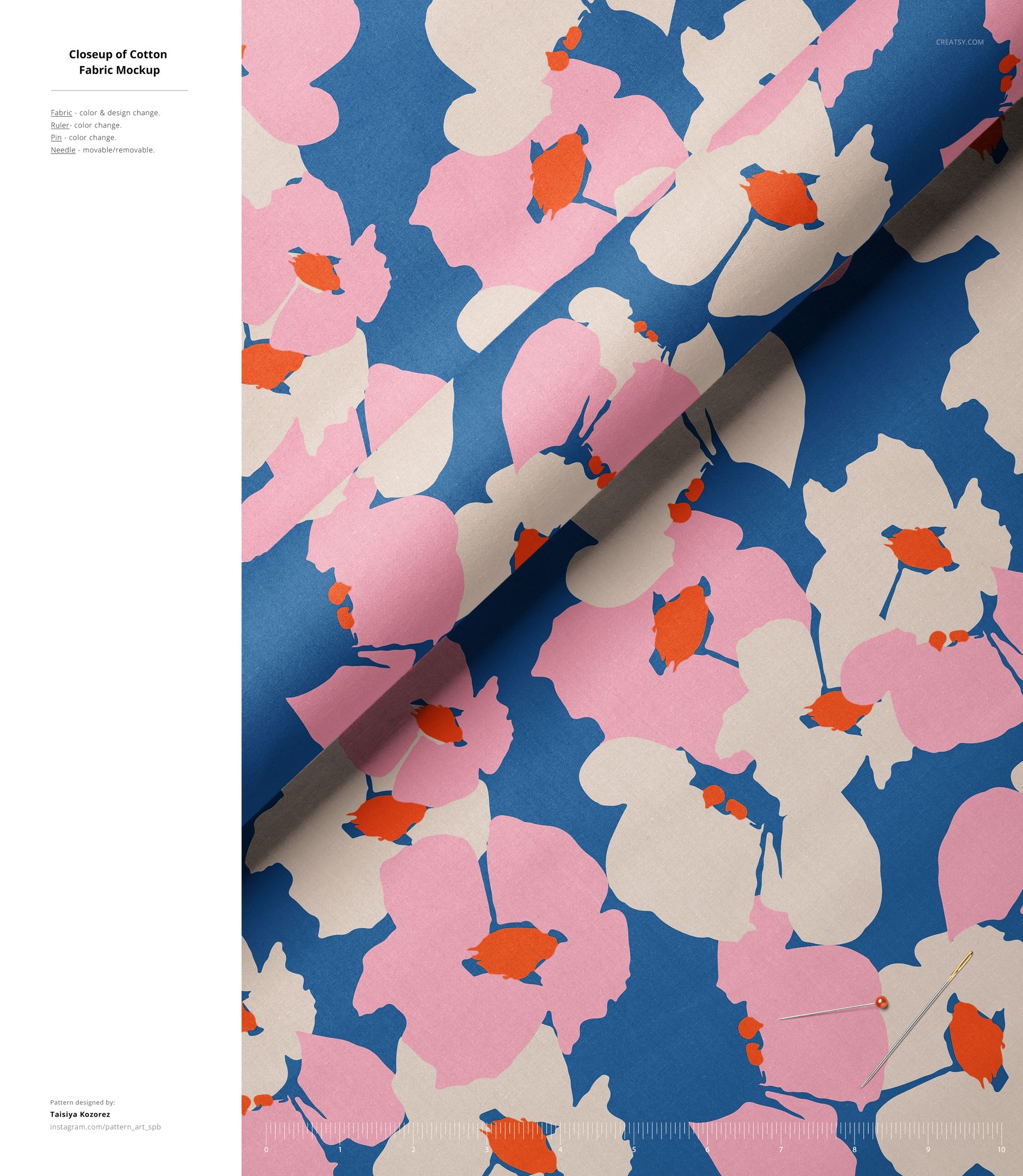 Fabric mockup featuring a large-scale floral design in pink, beige, orange, and blue, displayed from a top angle.