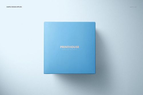PSD mockup showing a square blue gift box from a top-down perspective on a plain, light background.