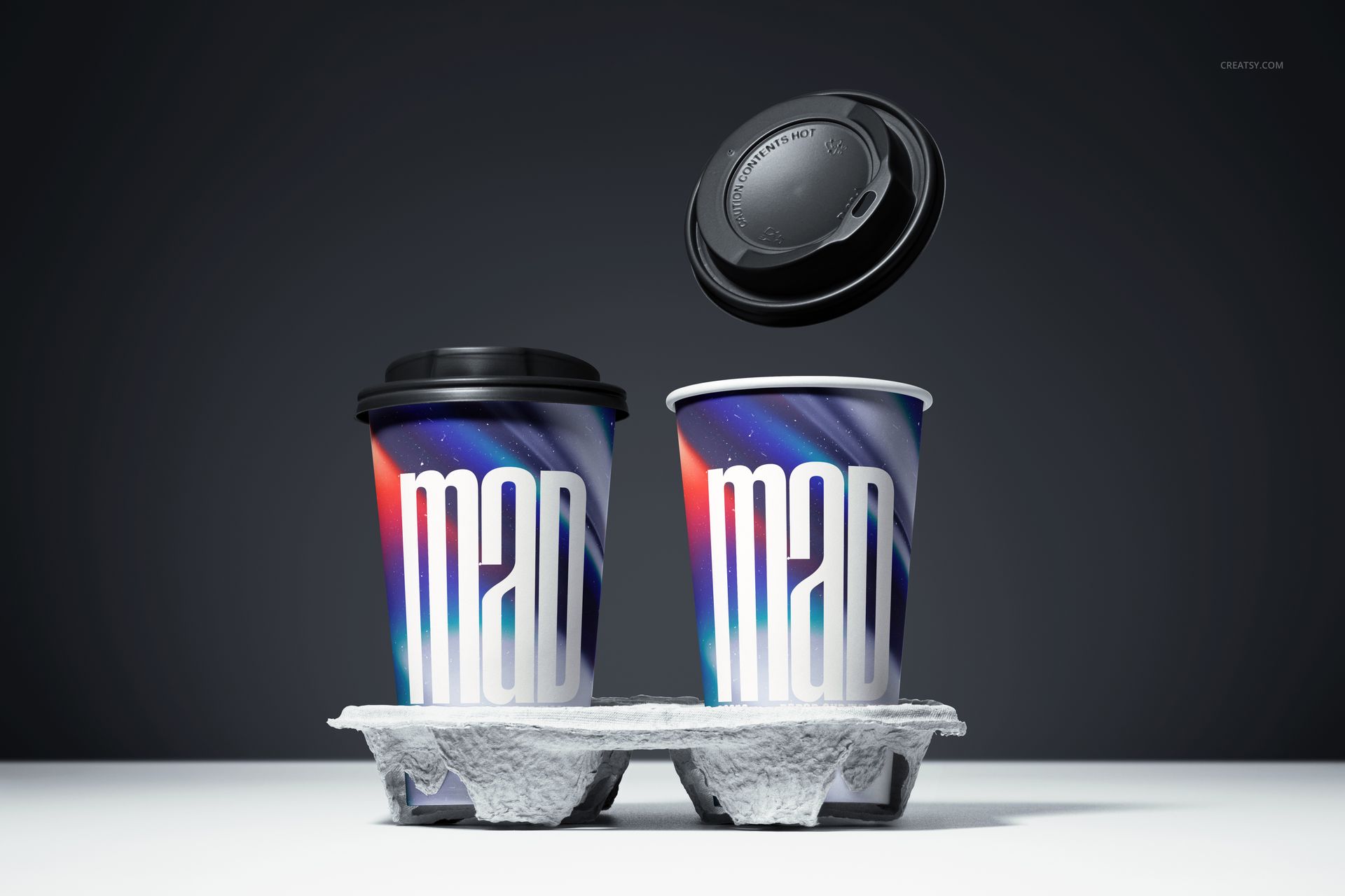 Mockup of paper cups with swirling blue and red designs, black lids, and large white text, set against a dark background.