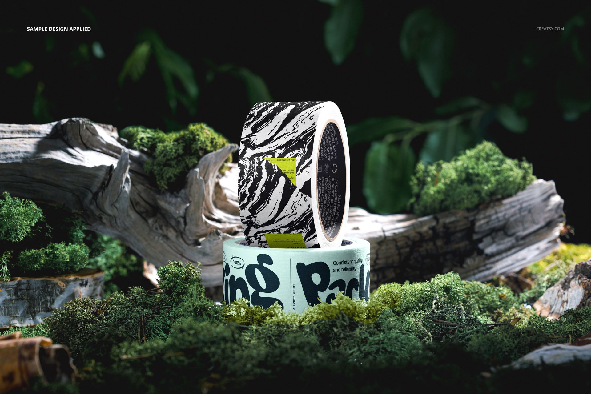 Packaging tape mockup featuring rolls with graphic designs, set on mossy logs in a natural woodland environment.
