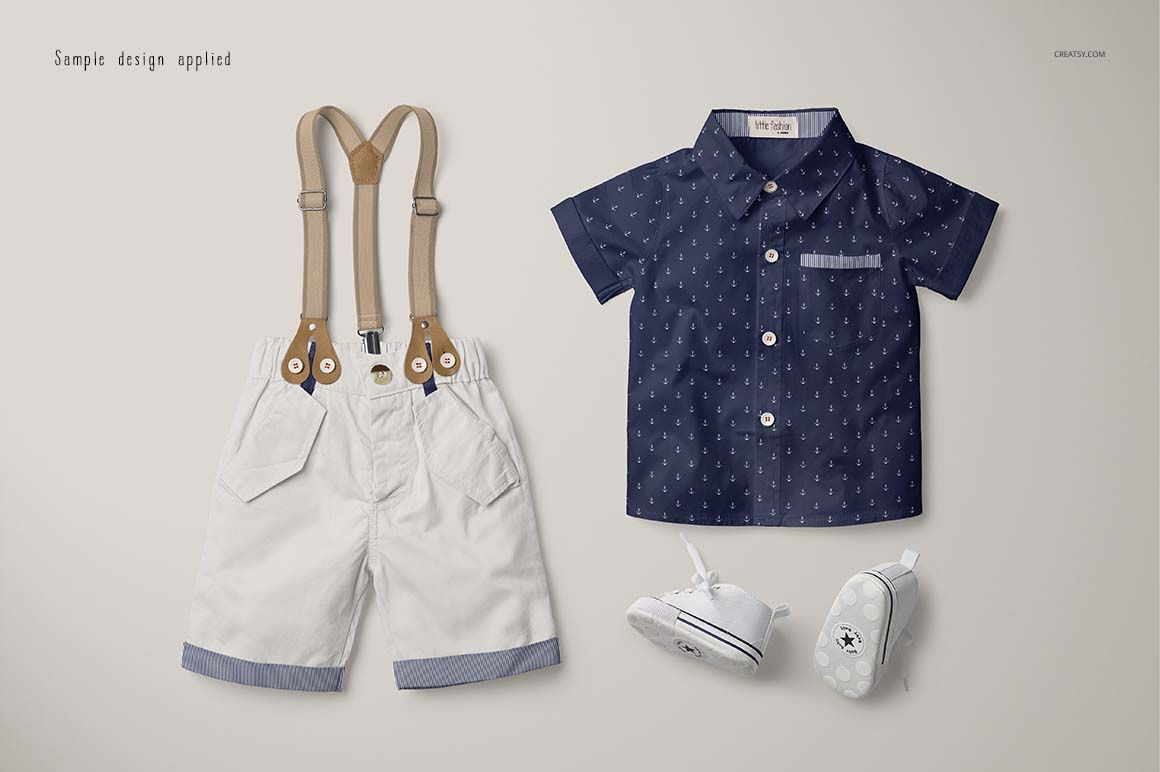 Boys formal set mockup featuring a navy short-sleeve shirt with subtle pattern, beige shorts with suspenders, and white shoes, displayed from above.