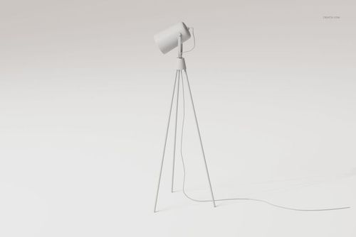 Metal tripod lamp with cylindrical shade in matte white, shown from a front angle on a plain light background.