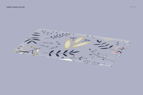 PSD mockup of a clear MacBook cover with illustrated plant elements, positioned diagonally against a soft pastel backdrop.