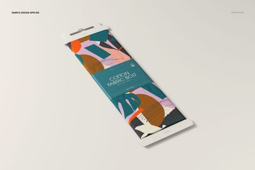 Rectangular fabric bolt mockup with colorful abstract pattern, viewed from an angled perspective on a white surface.