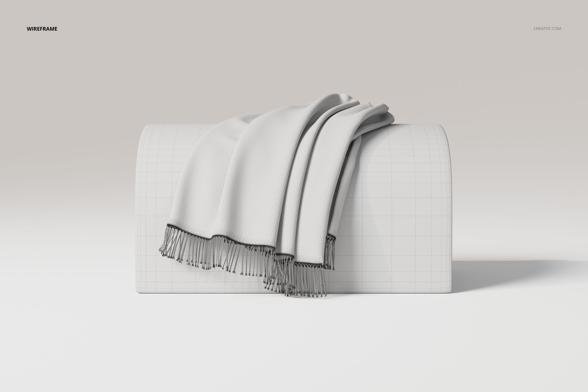 Draped throw blanket in light gray with fringed edges displayed on a curved rectangular block, front view.