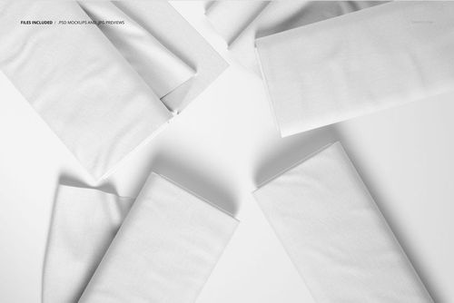 PSD mockup featuring plain white fabric bolts, viewed from a top perspective with subtle folds and light shading.