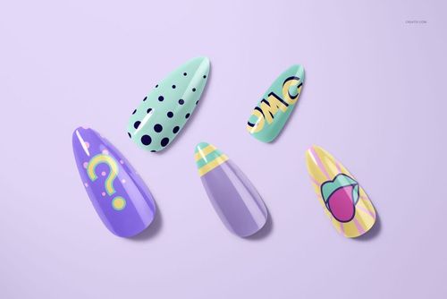 PSD mockup showing assorted nail tips with playful artwork, including polka dots and geometric motifs, top perspective.