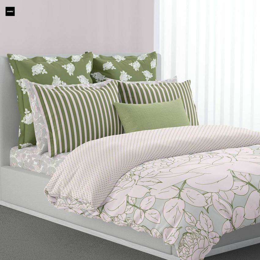 Bedroom scene bedding mockup showing a neatly made bed with green and white floral and striped pillows, and a patterned duvet.