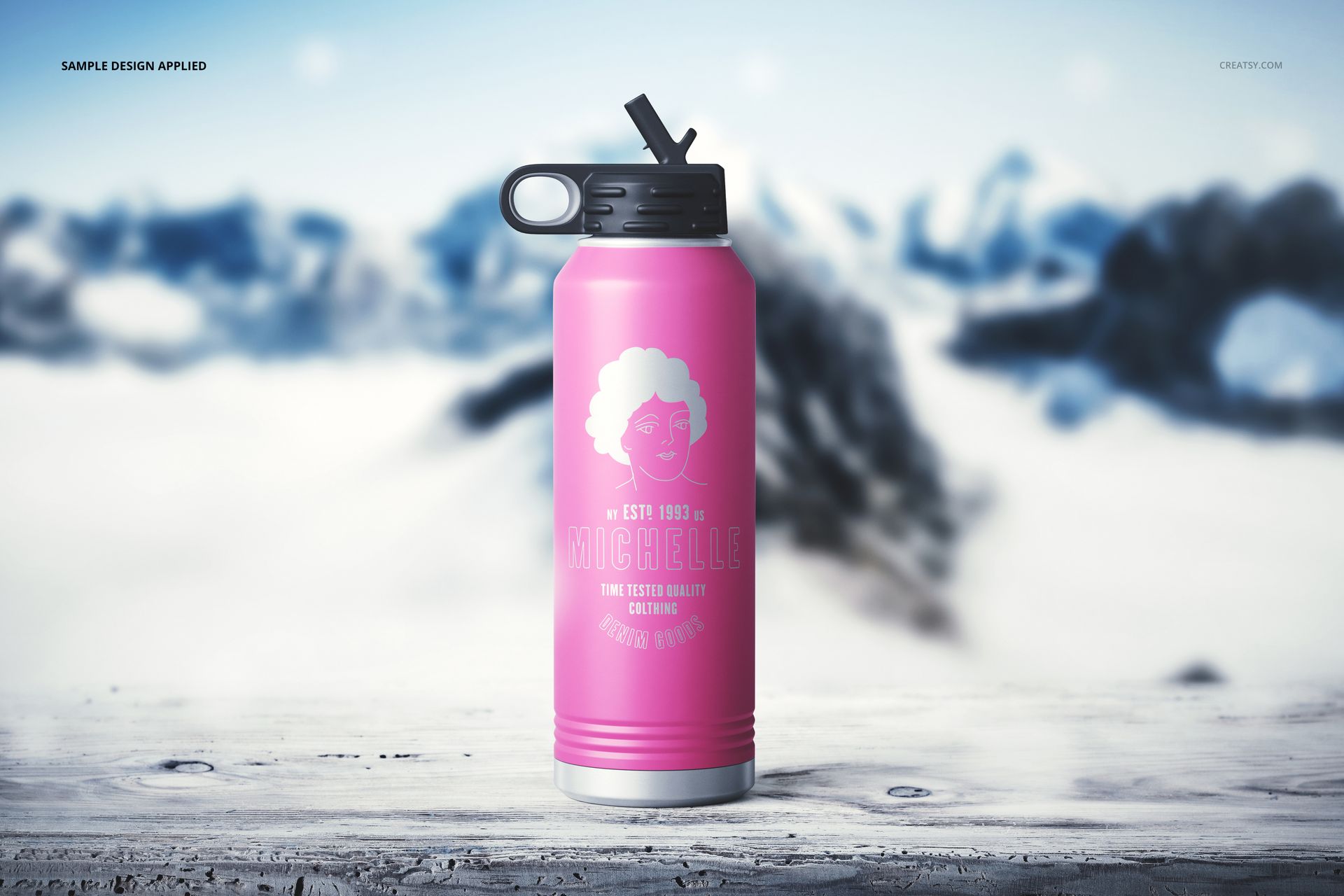 Front view of a pink 40 oz. water bottle mockup featuring a black cap, placed on a white textured surface with winter scenery.
