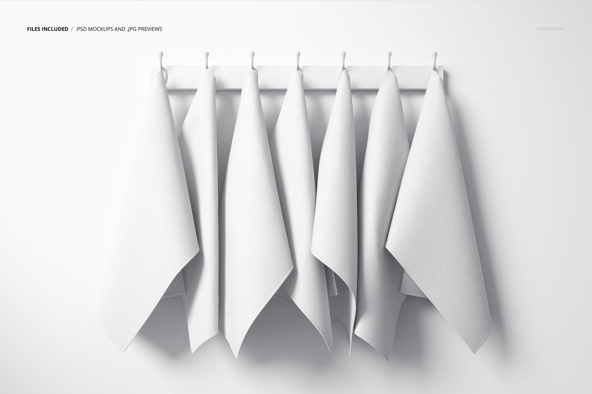 Six blank tea towels suspended on white hooks, evenly spaced on a wall-mounted rack, shown in a fabric mockup scene.