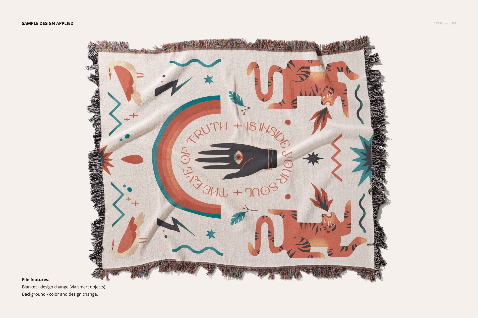 Jacquard fringed blanket mockup with colorful animal and geometric patterns, displayed flat on a neutral background.
