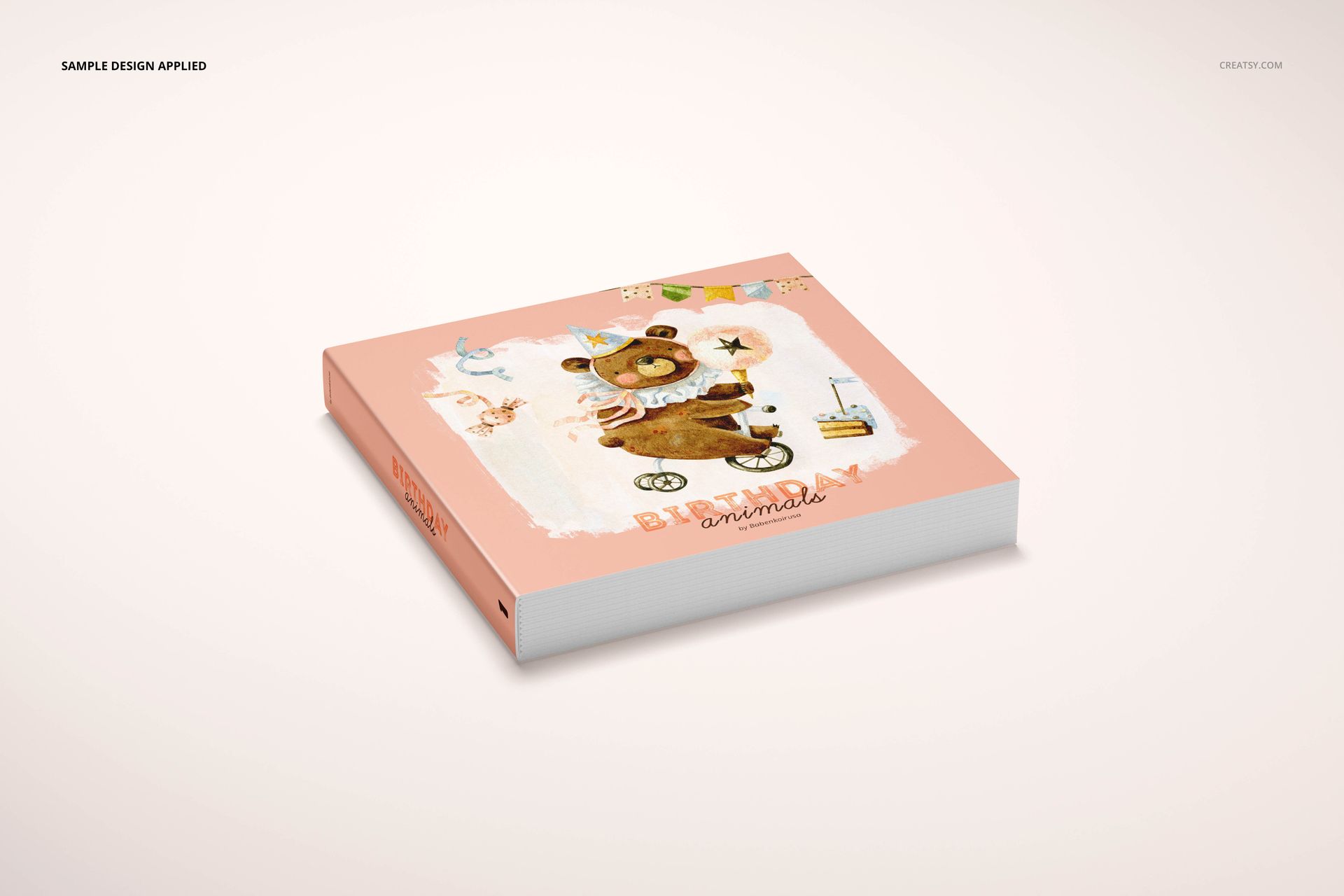 Children’s board book mockup with a pastel pink cover and animal artwork, displayed at a slight angle on a plain surface.