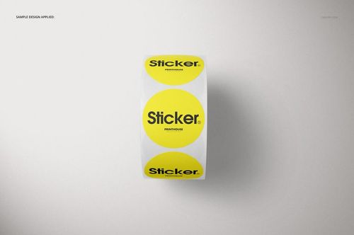 Yellow round stickers arranged on a roll, featuring bold black lettering, displayed in a realistic PSD mockup scene.
