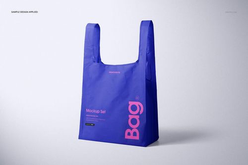 Blue ripstop reusable bag mockup with pink lettering, shown from the front at a slight angle on a neutral background.