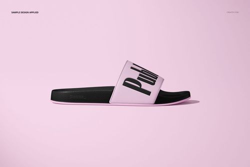 Slip-on slide sandal mockup shown in side view, featuring a black sole and pale pink strap with bold text design.