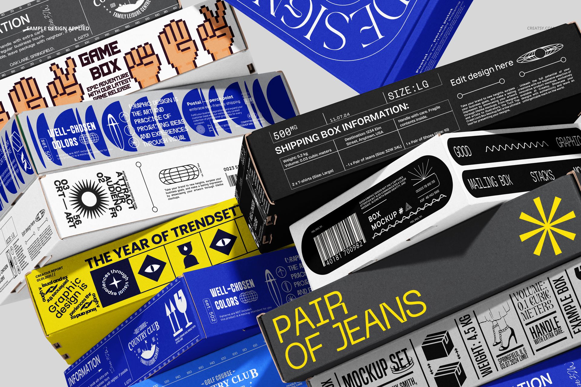 Assorted postal box mockups with printed graphics and text, displayed from an angled top-down perspective.