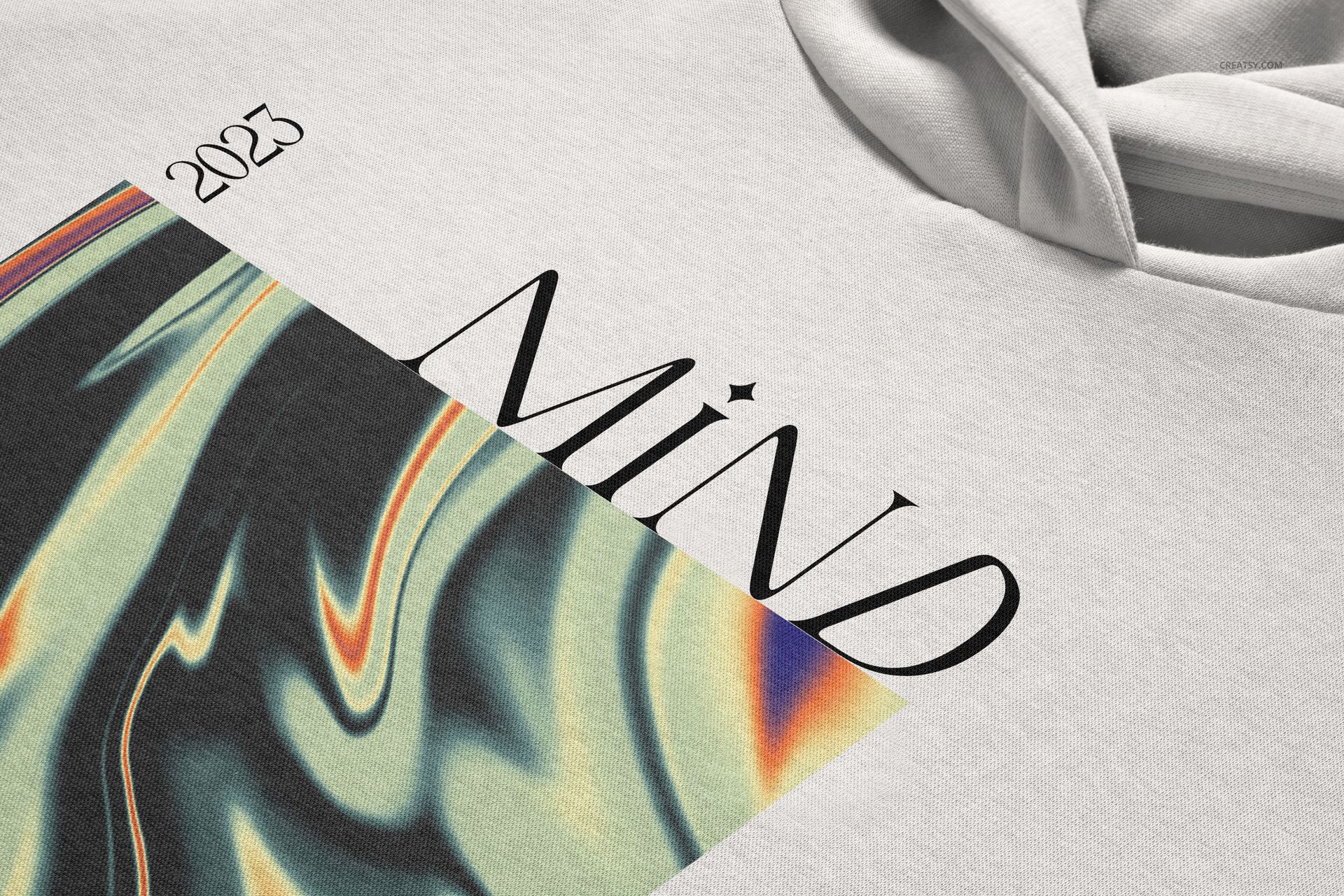Oversized hoodie mockup in light gray fabric, front view showing large hood and abstract colorful graphic design.