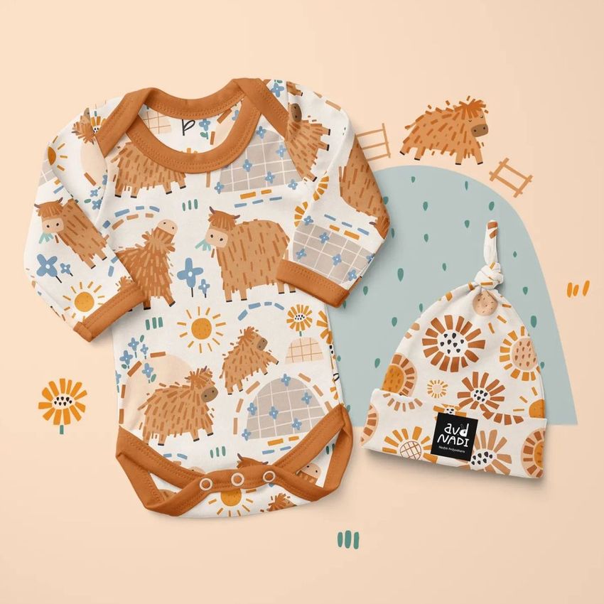 Baby long sleeve bodysuit mockup featuring a farm animal pattern in brown, blue, and orange, shown with a matching knotted hat.