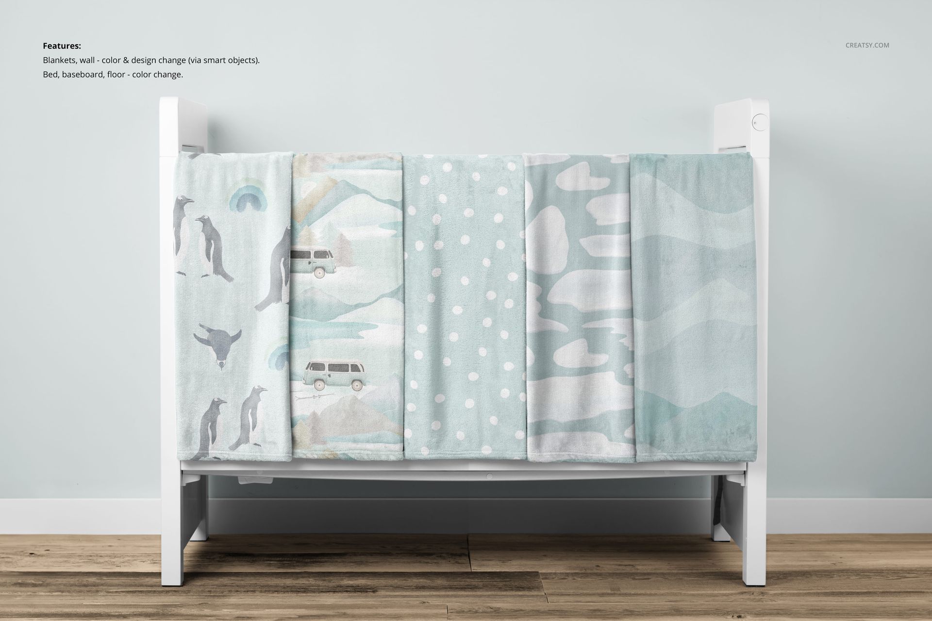 PSD mockup of fleece blankets featuring playful animal, vehicle, and abstract prints displayed on a white crib.