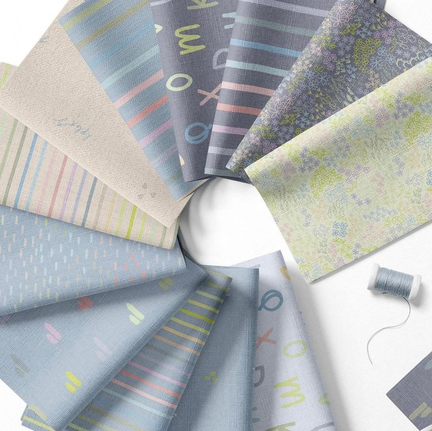 Folded fabric swatches mockup arranged in a circular pattern, featuring pastel stripes, letters, and floral designs on a white background.