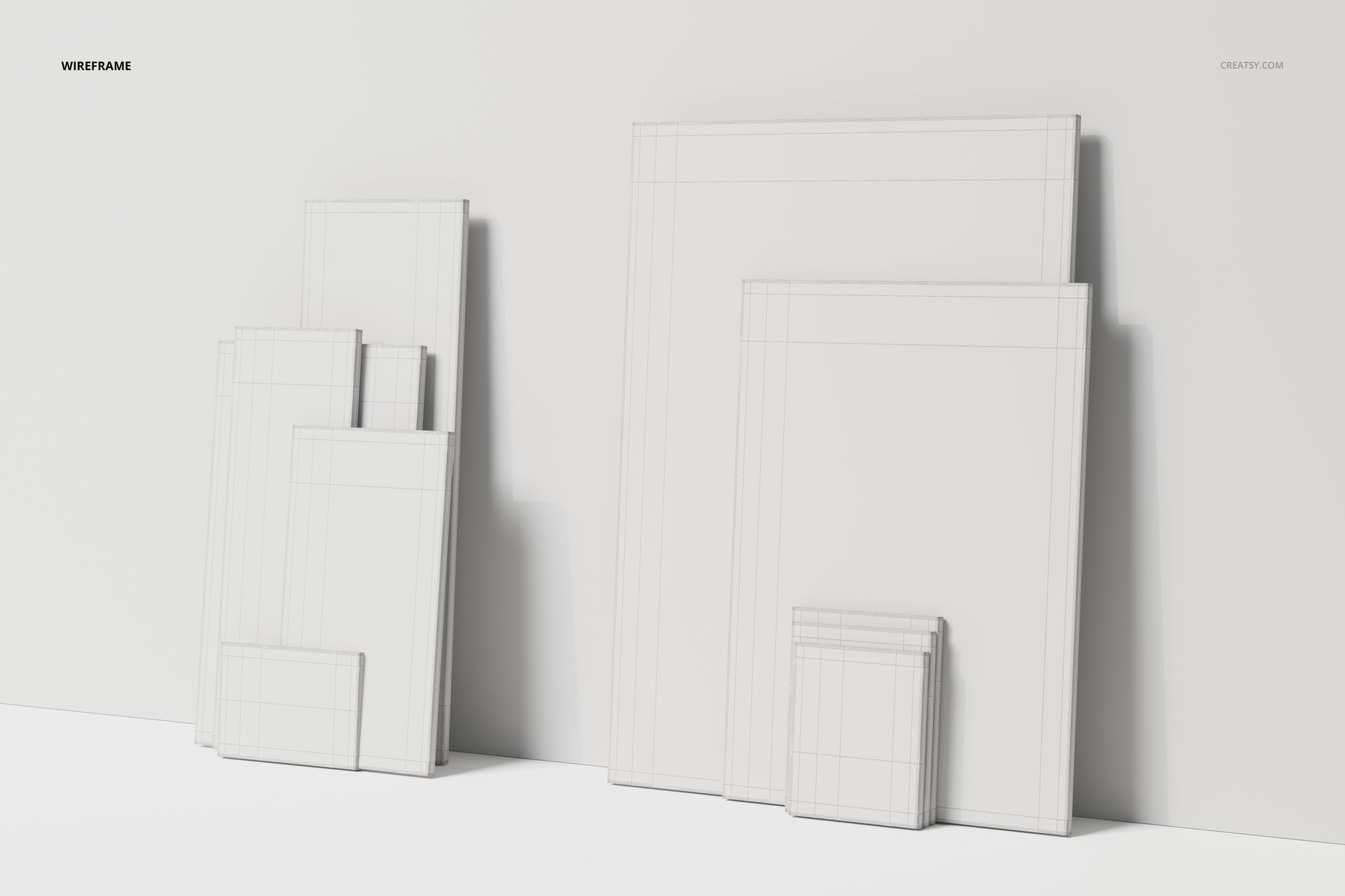 Variety of blank canvas models in different sizes with visible wireframe lines, arranged against a white wall.