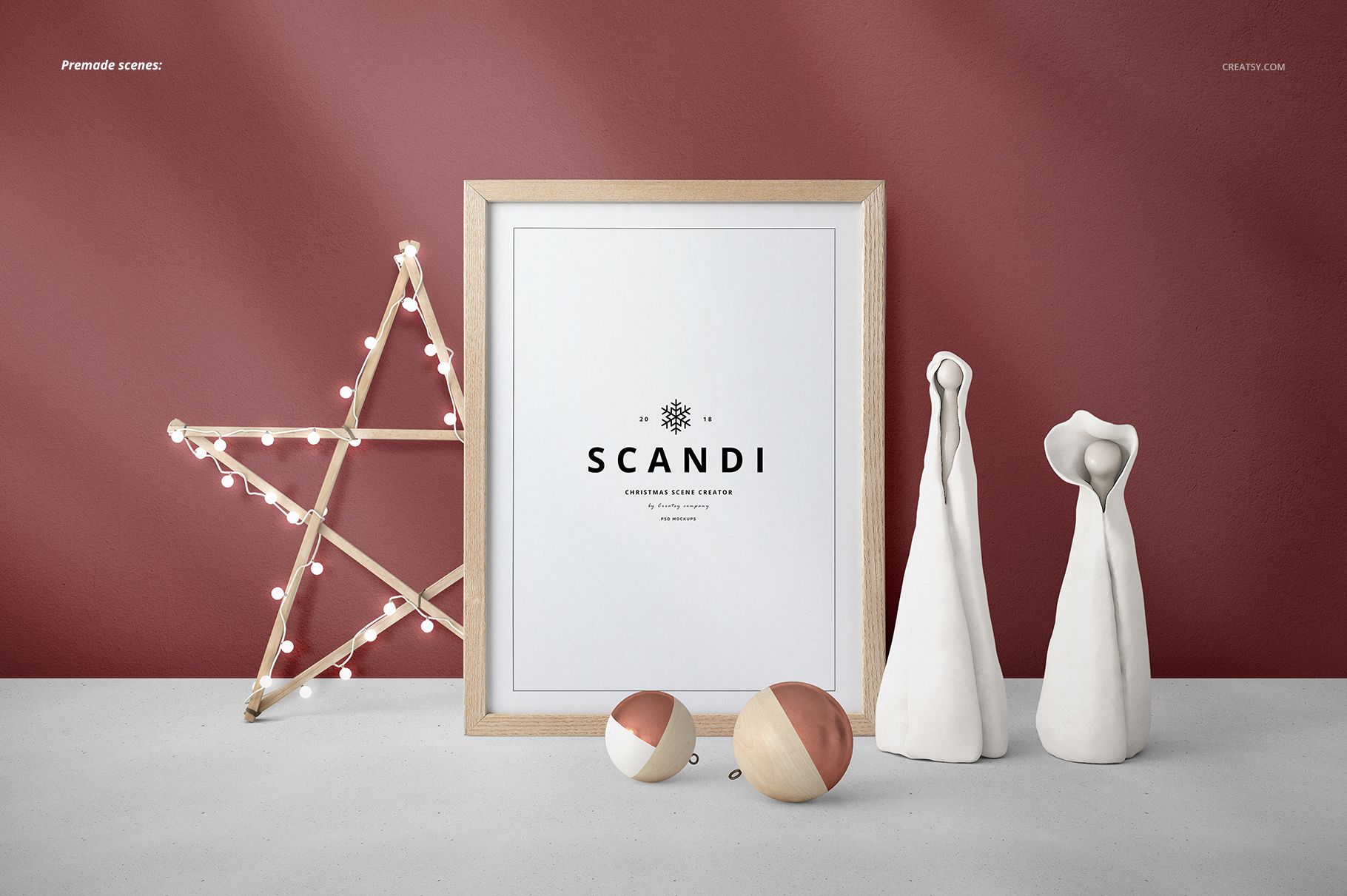 Front view of a Christmas scene mockup featuring a framed print, star-shaped lights, and minimalist decorations.