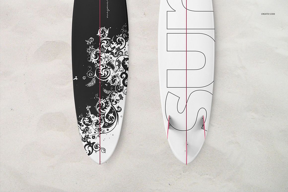 Surfboard hybrid mockup showing a pair of boards on a sandy surface, featuring contrasting graphic designs.