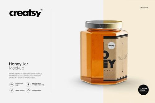Hexagonal honey jar mockup with clear glass, golden honey, black lid, and customizable beige label, front perspective.
