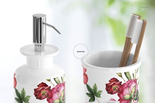 Front view of bath accessories mockup set with floral pattern, featuring a soap dispenser and toothbrush holder.