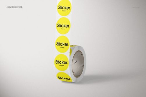 Yellow round stickers on a roll, displayed upright with several labels visible, in a realistic mockup scene.