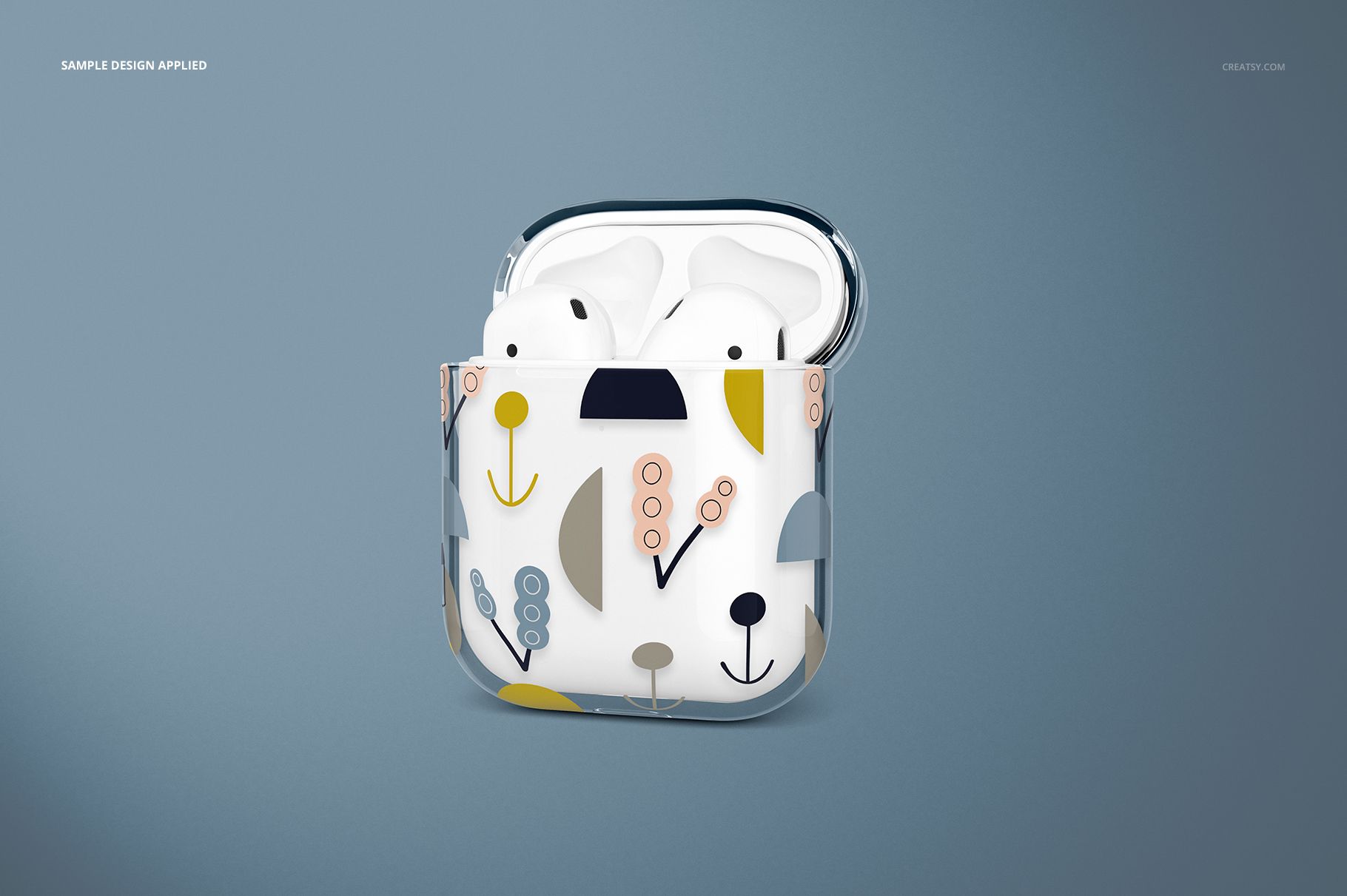 Front-facing AirPods clear case mockup featuring playful geometric shapes in blue, yellow, and gray tones.