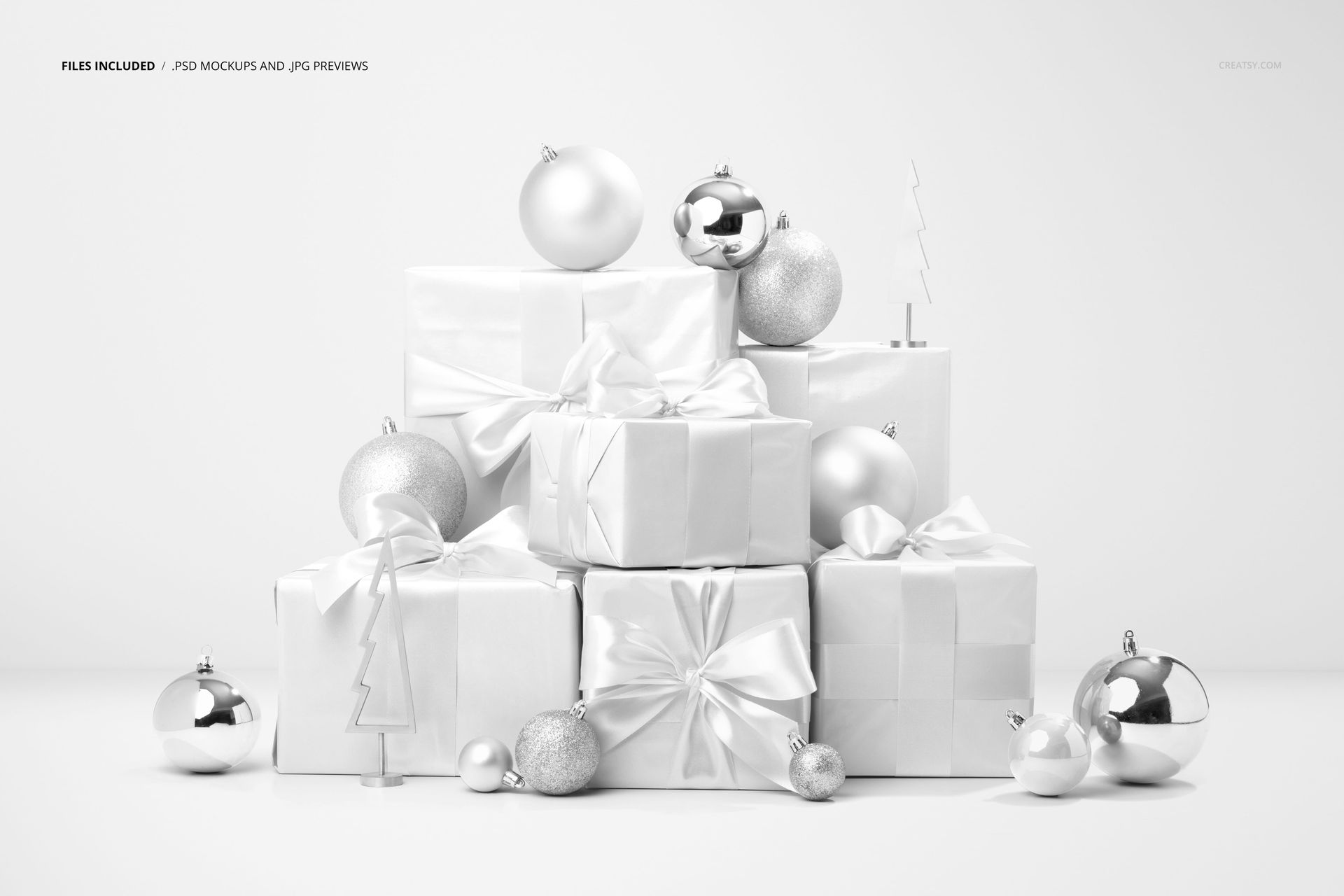 PSD mockup featuring a group of neatly wrapped white presents, glossy baubles, and small gold Christmas trees arranged together.