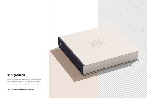 PSD mockup of a closed artbook featuring a plain beige cover, dark spine, and shadow on a minimalist surface.