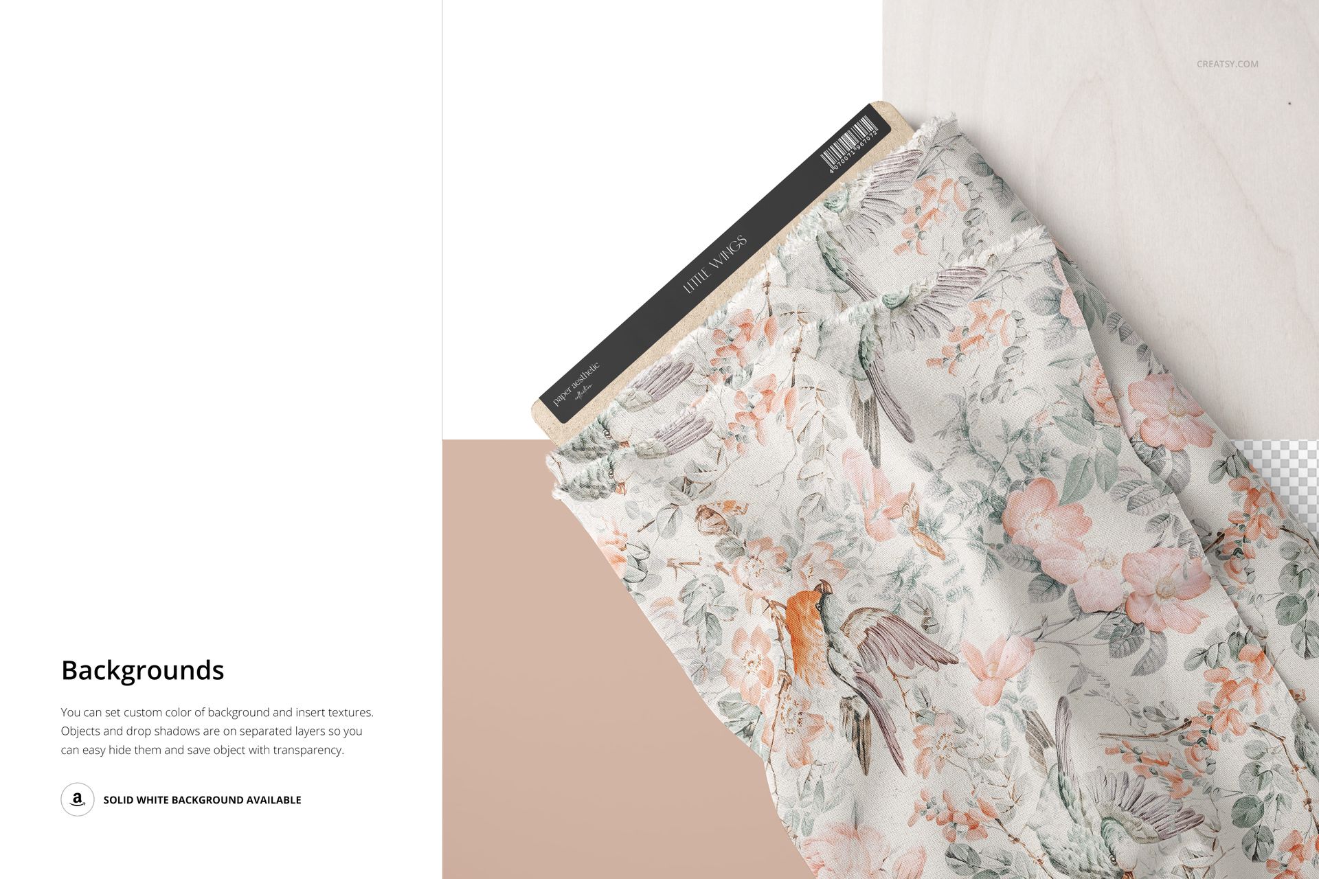 Top view of a patterned fabric bolt featuring pastel flowers and birds, displayed alongside sewing props in a mockup.