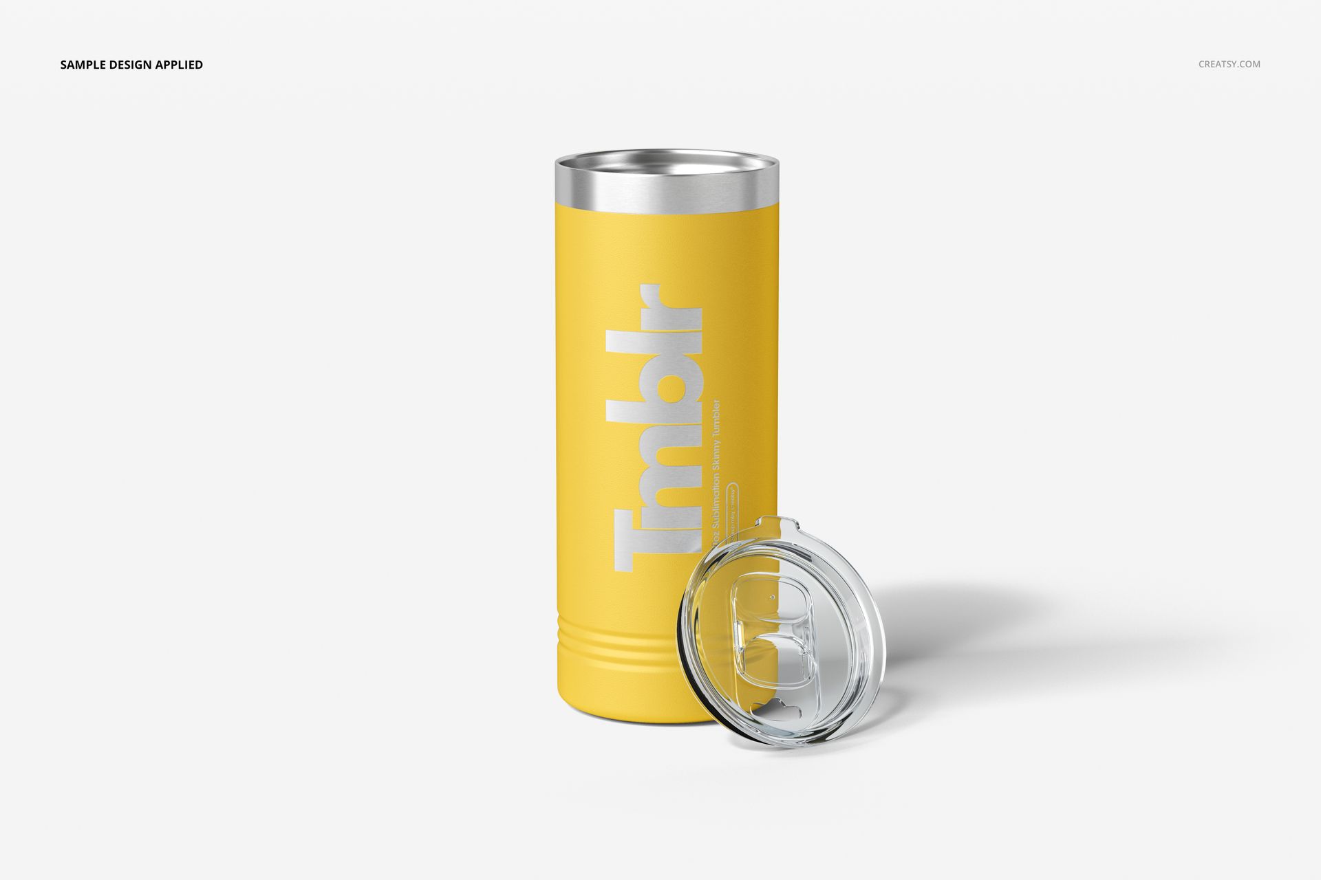 PSD mockup of a yellow skinny tumbler for engraving, displayed with its clear lid off and positioned on a clean white backdrop.