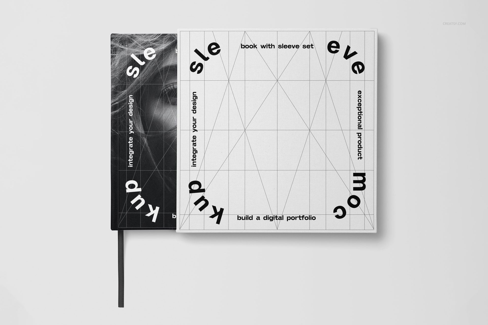 Top view of a hardcover book mockup set with a white sleeve featuring bold black geometric text and lines.