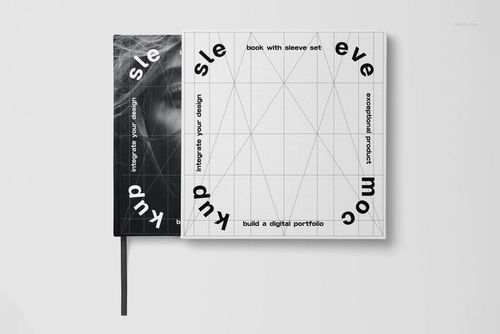 Top view of a hardcover book mockup set with a white sleeve featuring bold black geometric text and lines.