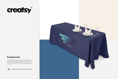 PSD mockup of a table featuring a navy tablecloth and runner, with tableware and two folded napkins on top.