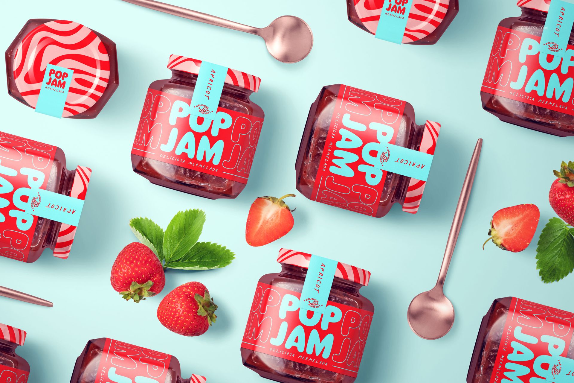 PSD mockup of several glass jam jars with vibrant red packaging, surrounded by strawberries and silver spoons.